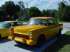 1955 Chevy, 2 door post, with a 1972 corvette engine, yellow exterior paint