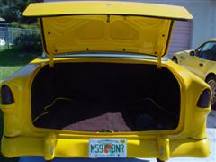 1955 Chevy, 2 door post, with a 1972 corvette engine, yellow exterior paint