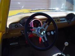 1955 Chevy, 2 door post, with a 1972 corvette engine, yellow exterior paint