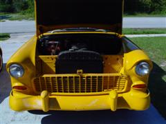1955 Chevy, 2 door post, with a 1972 corvette engine, yellow exterior paint